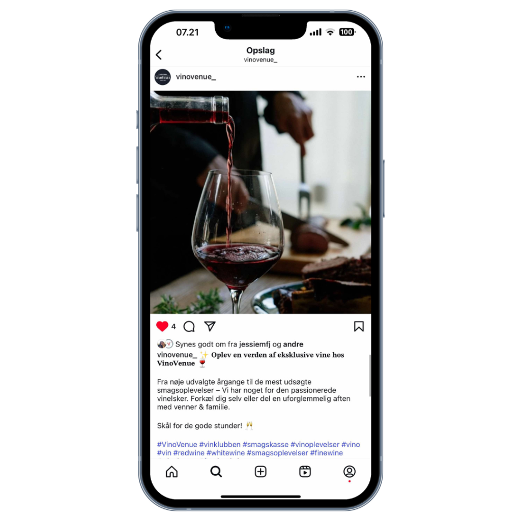 Instagram opslag med vinflaske vist på en smartphone.